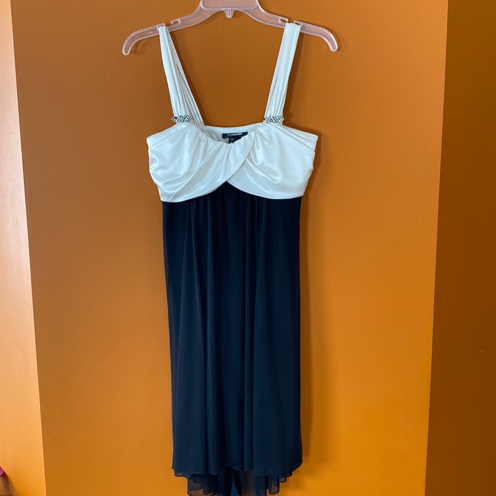 2/$25. My Michelle lovely little cocktail dress in size small. Black and white.